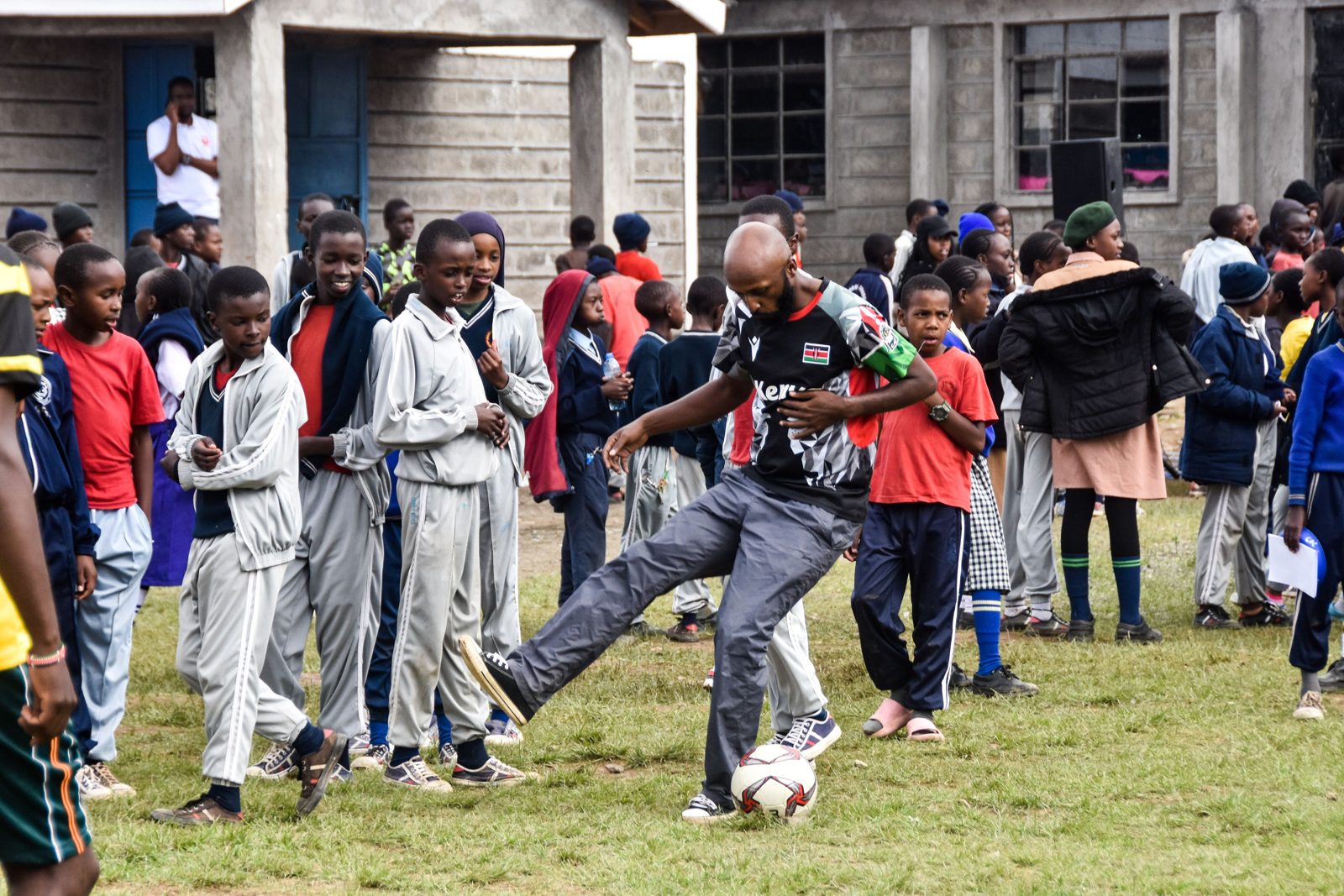 Kicking a ball around with pupils