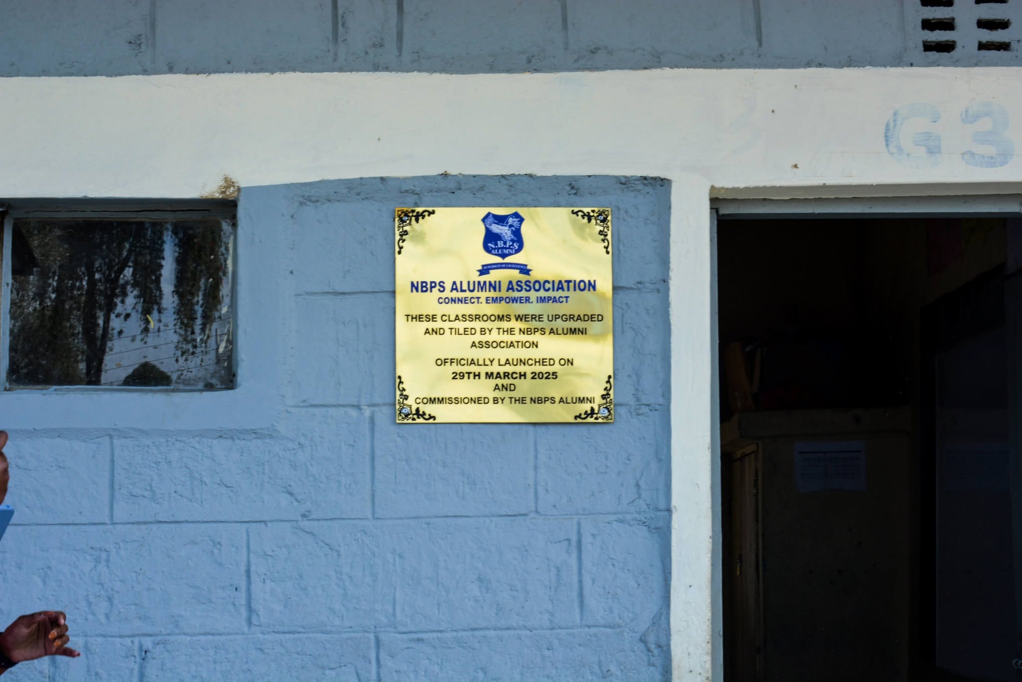 The plaque outside classroom G3